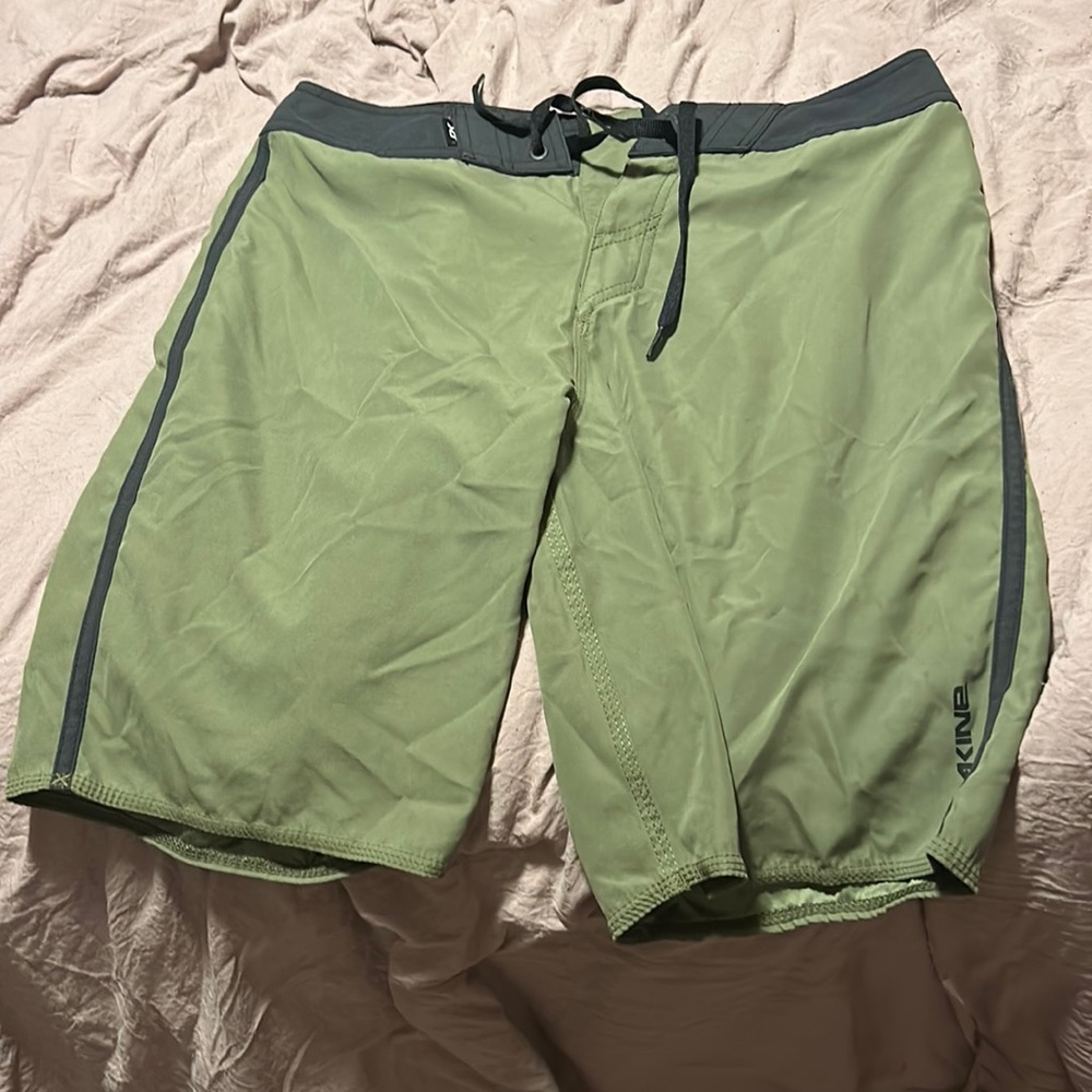 DAKINE, size 31, olive green swim trunks, never worn